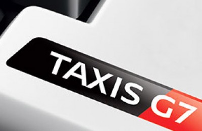 Logo de TaxisG7 sur la touche enter d'un clavier