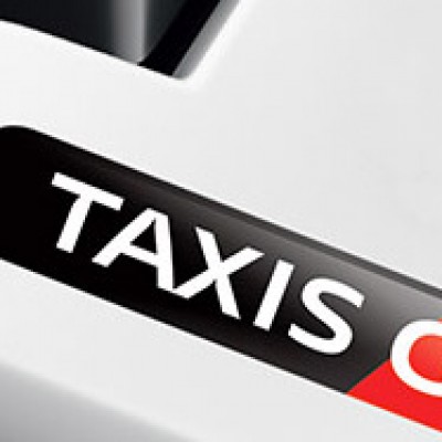 Logo de TaxisG7 sur la touche enter d'un clavier